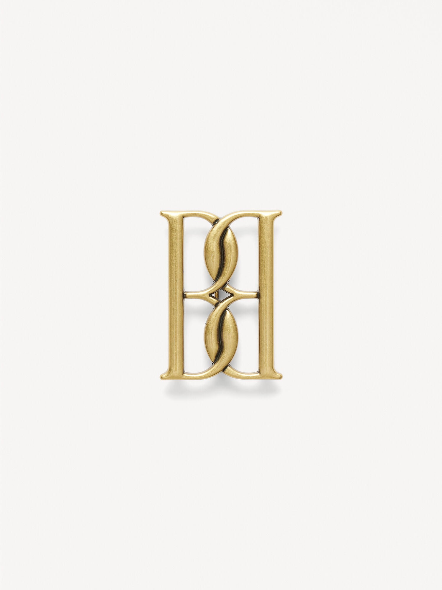 Mono small gold-tone brooch