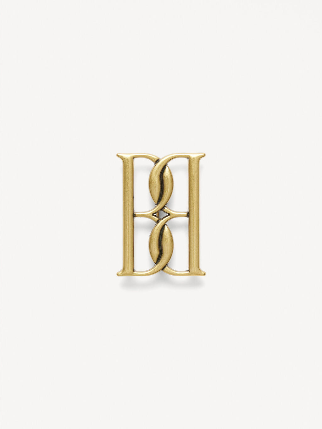Mono small gold-tone brooch
