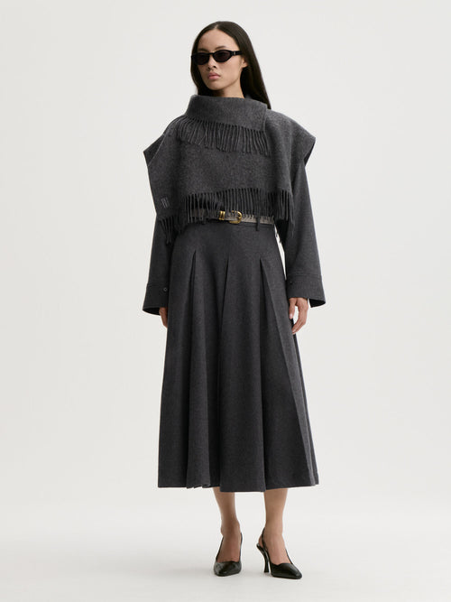 Turtla wool fringe bib