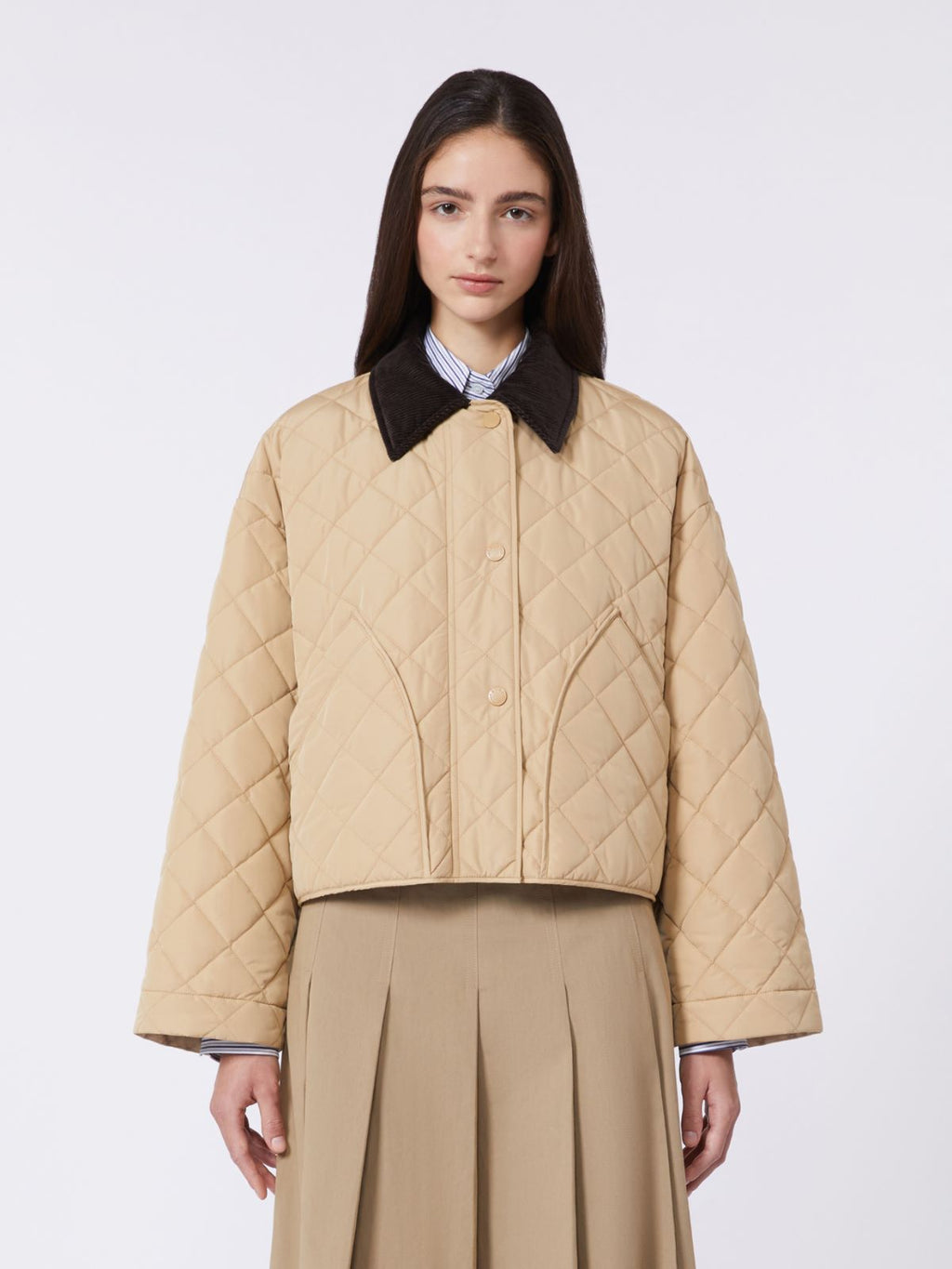Reversible padded jacket in water-repellent fabric