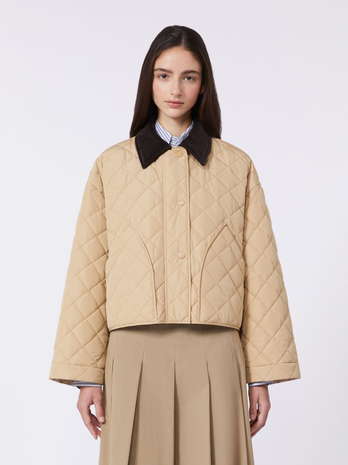 Reversible padded jacket in water-repellent fabric