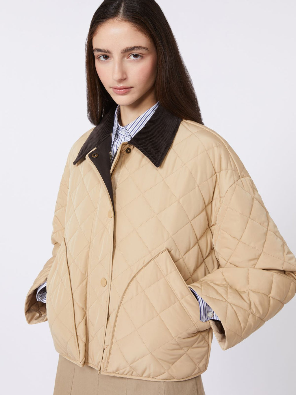 Reversible padded jacket in water-repellent fabric