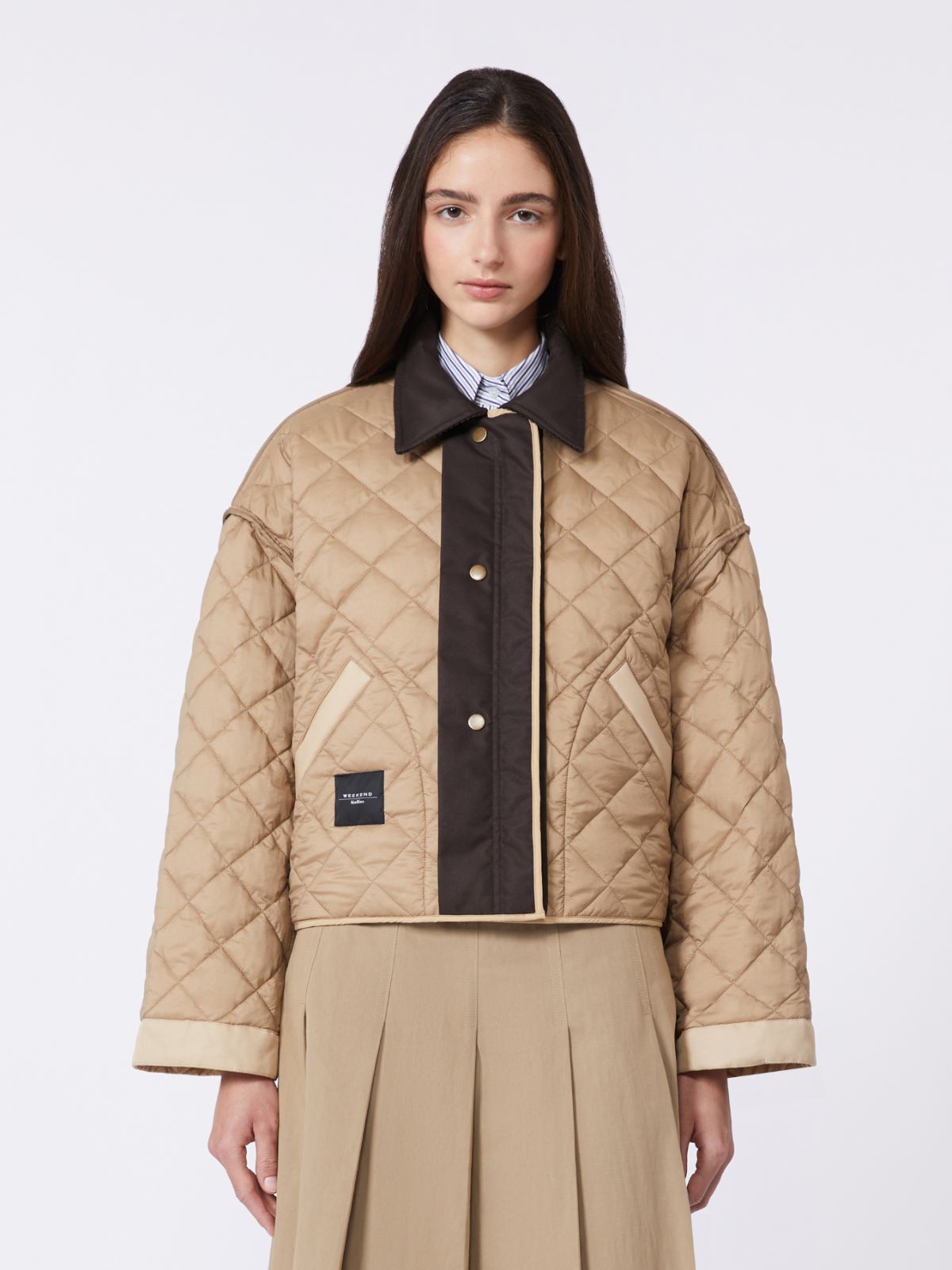 Reversible padded jacket in water-repellent fabric